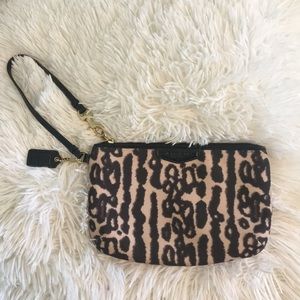 Cheetah print Coach wristlet